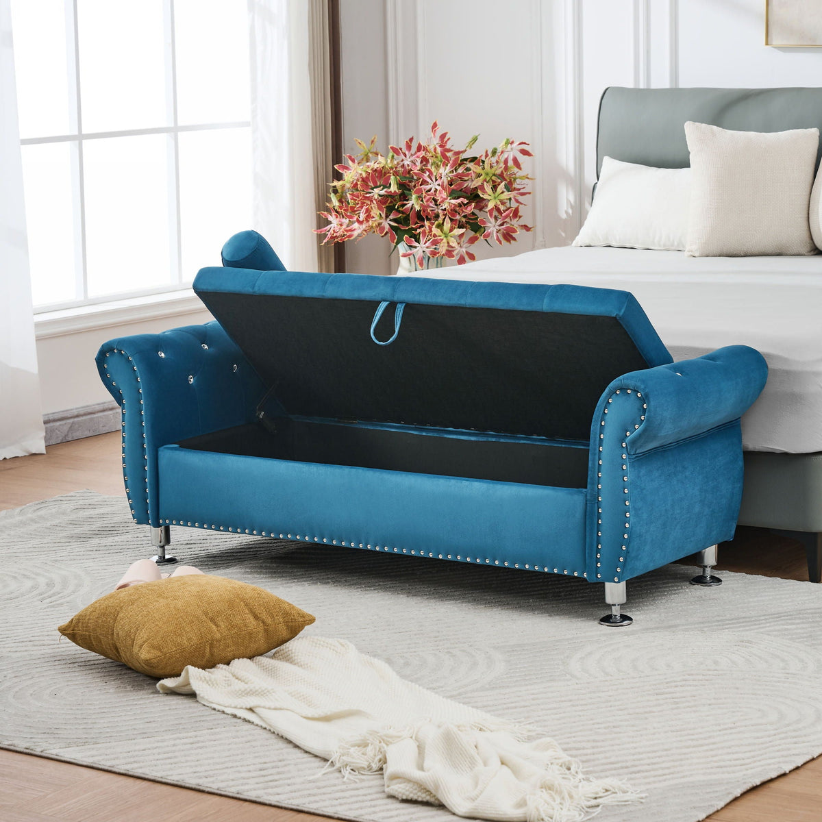 Blue velvet storage bench with crystal button tufting and studded edges on Tampa Home & Garden Store