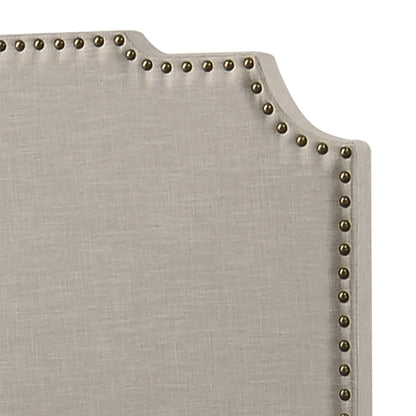 Copper Eastern King Panel Bed beige upholstered headboard with brass nailhead trim on Tampa Home & Garden Store