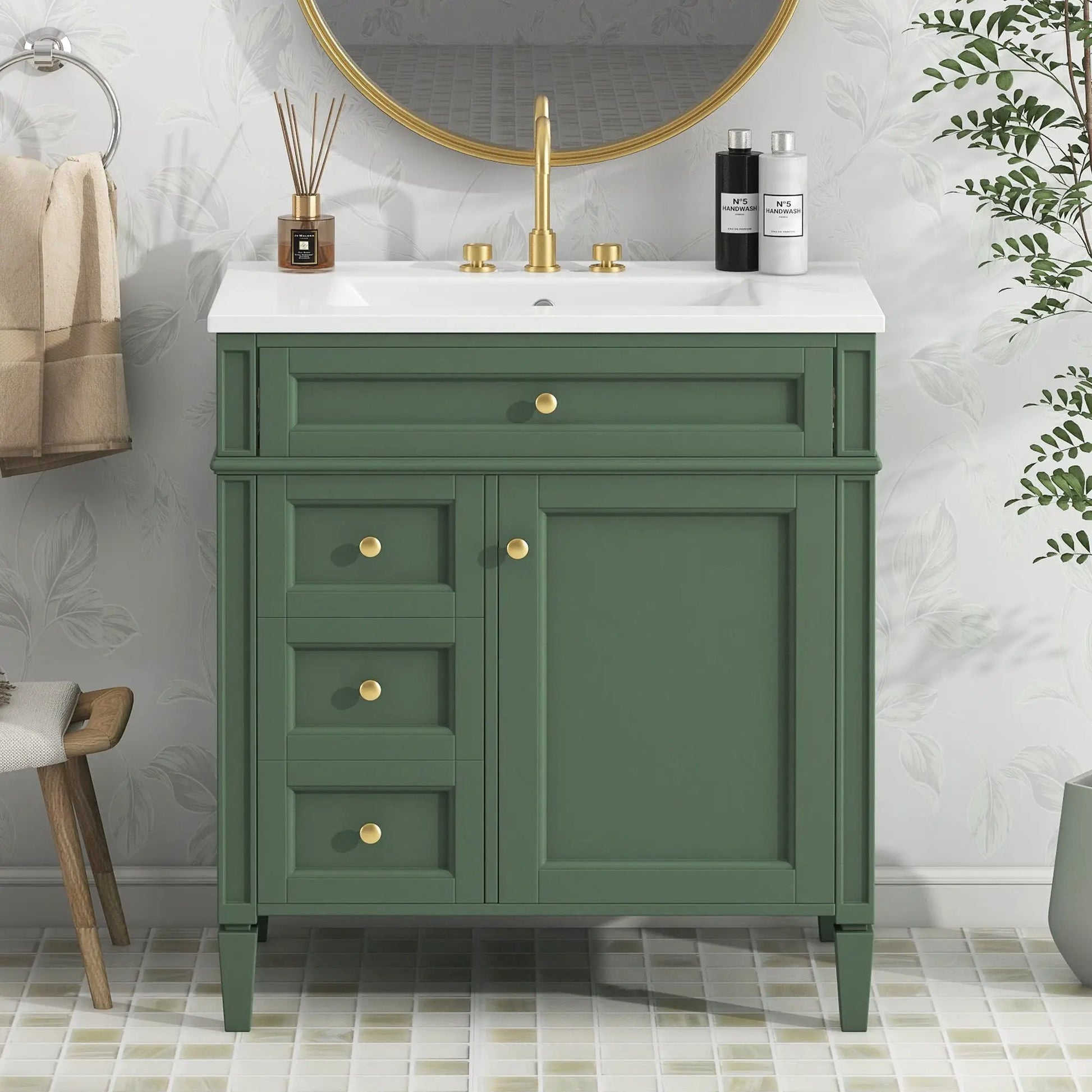 Bathroom vanity with green base, white sink and brass hardware on Tampa Home & Garden Store