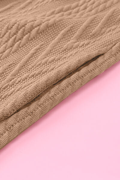 Retro camel jacket Stevvex knit fabric close-up with cable knit texture on Tampa Home & Garden Store