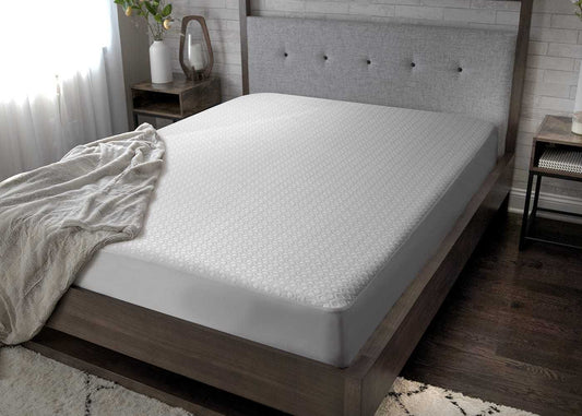 BedGear Dri-Tec split California King mattress protector in white on a wood platform bed on Tampa Home & Garden Store