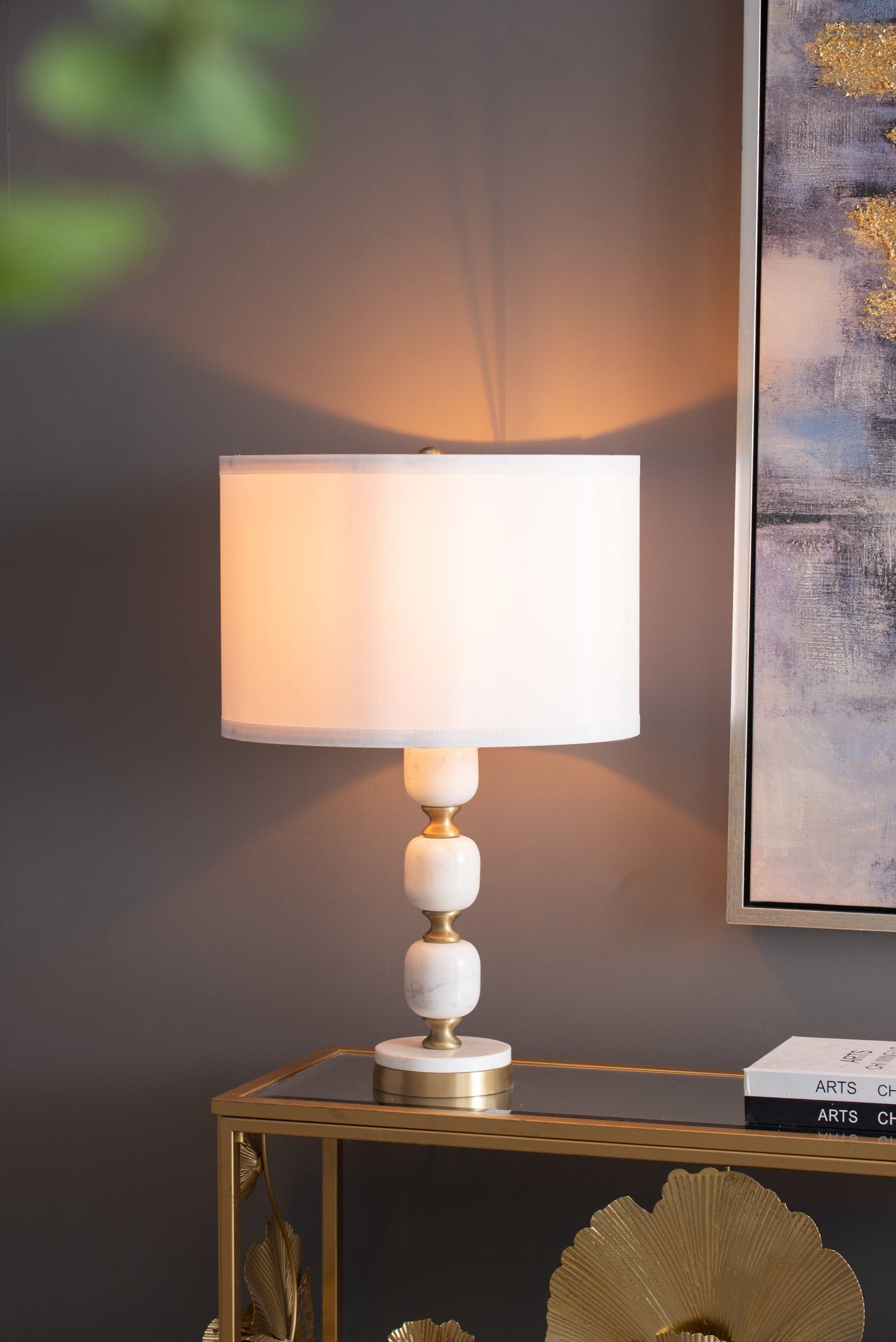 D15x26.5 Table Lamp with white shade and stacked ceramic bead base on a gold console table on Tampa Home & Garden Store