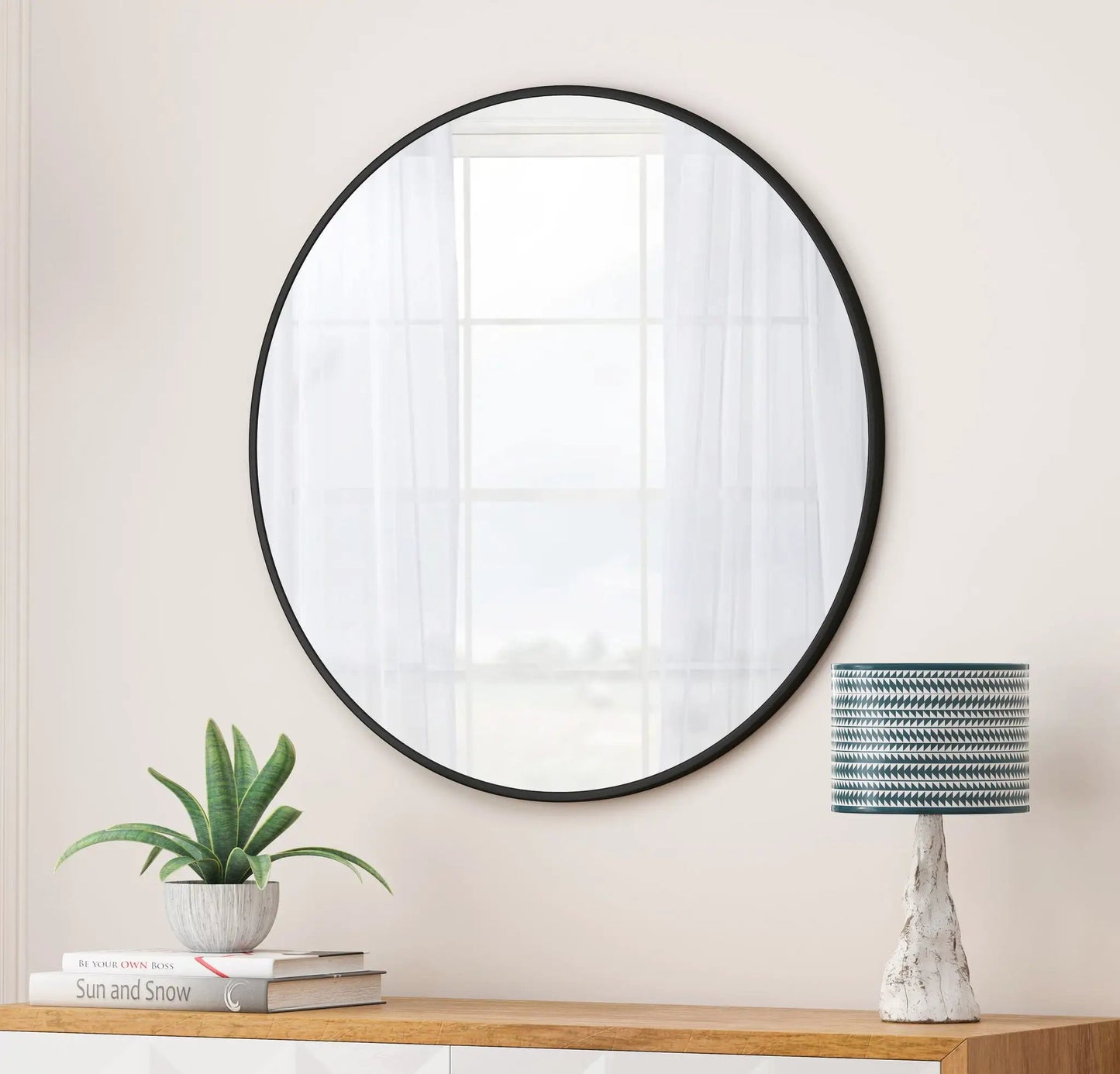 Round metal-framed wall mirror by Unique Piece Furniture; black frame vanity mirror on Tampa Home & Garden Store
