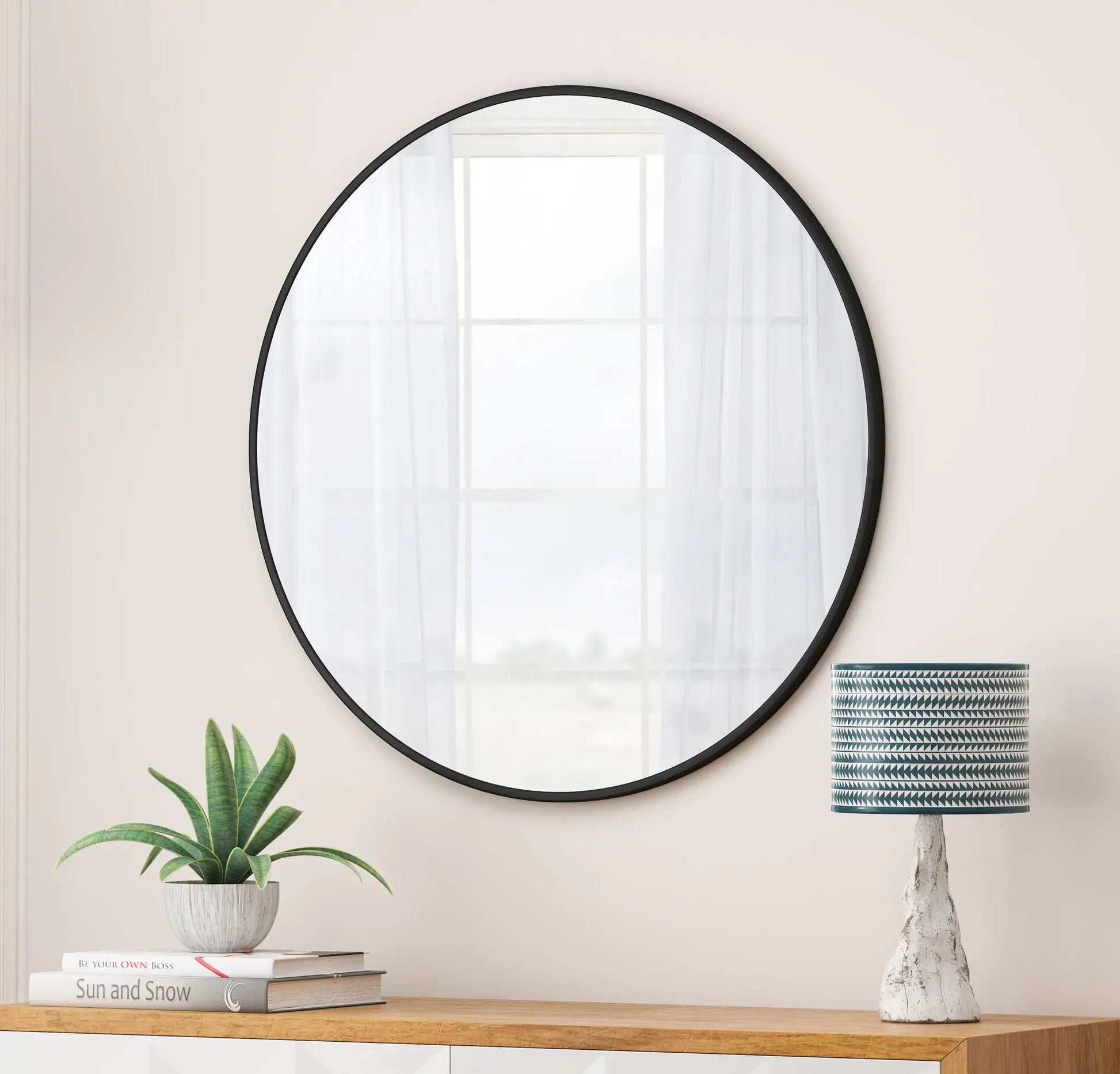 Round metal-framed wall mirror by Unique Piece Furniture; black frame vanity mirror on Tampa Home & Garden Store