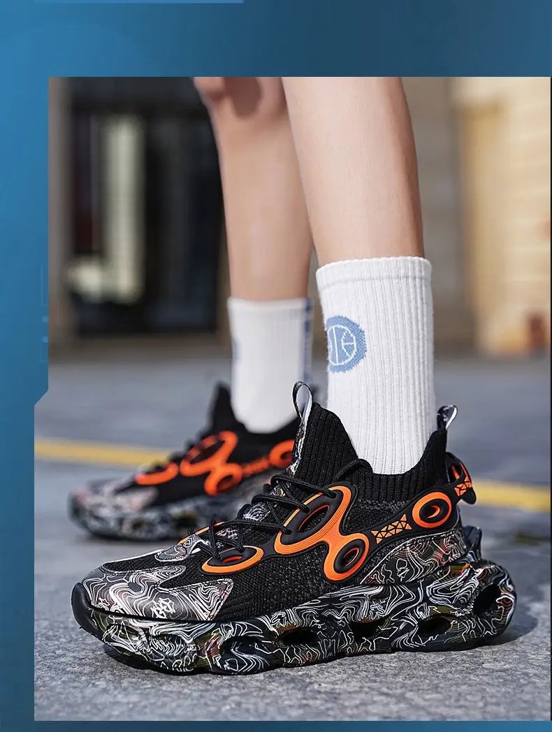 Galaxy Blade Sneaker pair, black knit upper with orange accents and marbled sole on Tampa Home & Garden Store