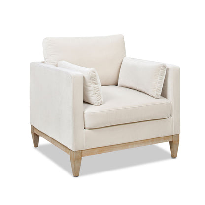 Modern Farmhouse Arm Chair in cream fabric with reversible cushions and light wood legs on Tampa Home & Garden Store