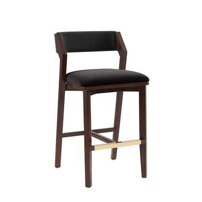 Bar height barstool with backrest in black upholstery and wood frame with brass footrest on Tampa Home & Garden Store