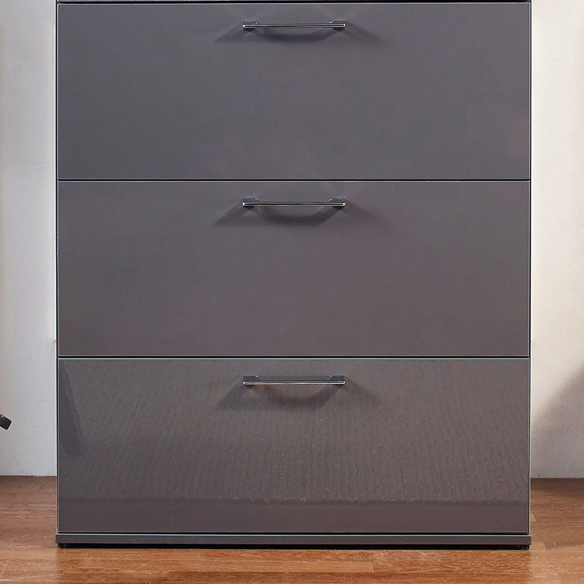 Glossy 4-drawer accent chest in dark gray with sleek silver pulls by HouseOfZazla on Tampa Home & Garden Store