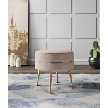 Bailey Upholstered Accent Ottoman by HouseOfZazla, round blush-pink fabric with light wood legs on Tampa Home & Garden Store