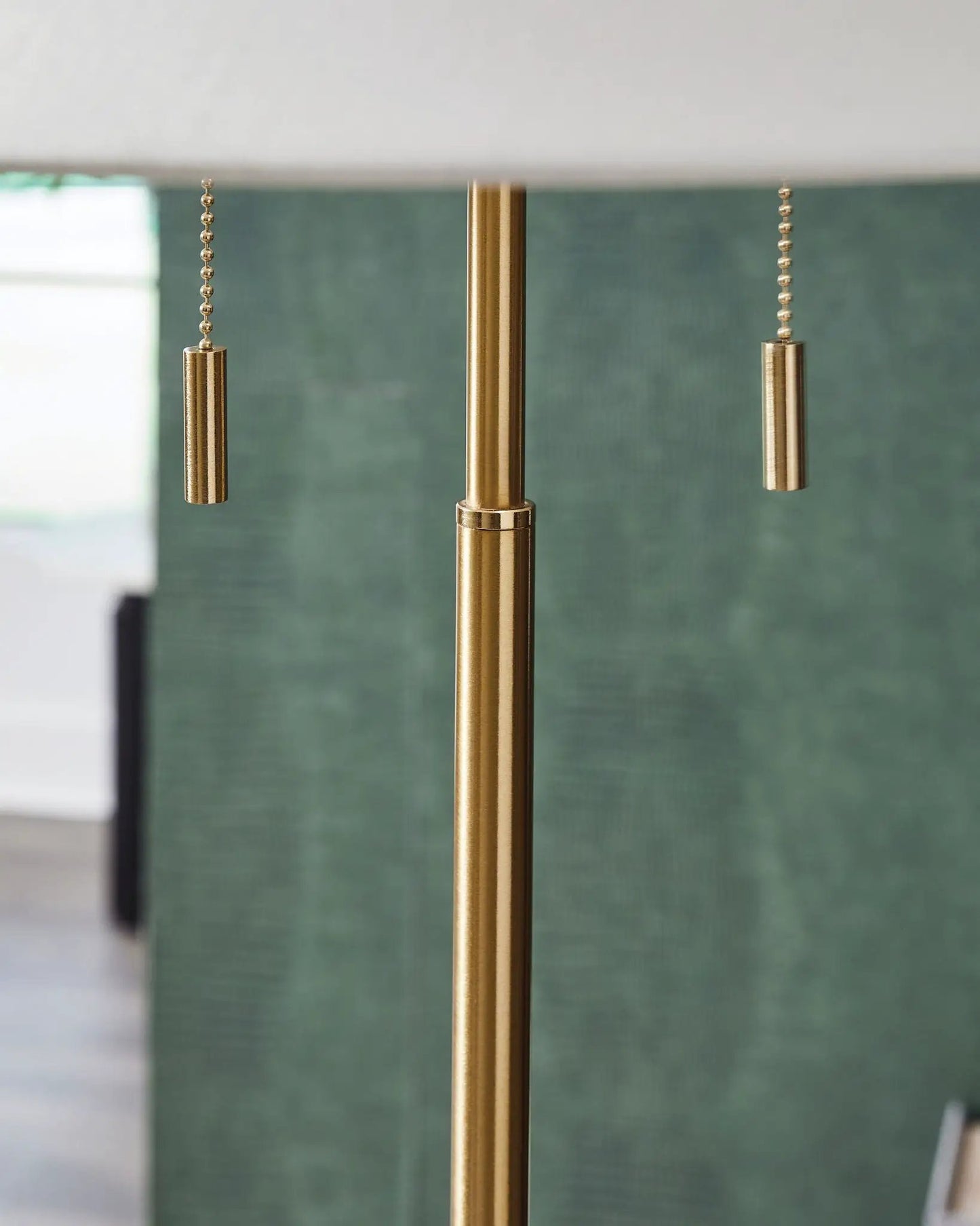 Haigwood metal floor lamp with brass finish and dual hanging cylinders on bead chains on Tampa Home & Garden Store