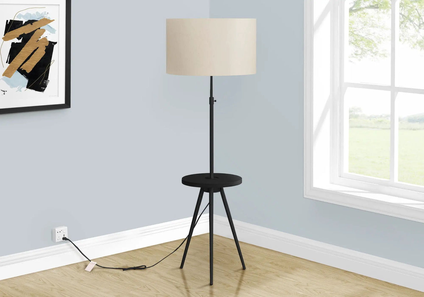Floor lamp by Unique Piece Furniture with black tripod base and beige shade in a blue room on Tampa Home & Garden Store