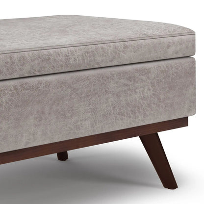 Owen lift-top large coffee table storage ottoman beige fabric wood legs Unique Piece on Tampa Home & Garden Store