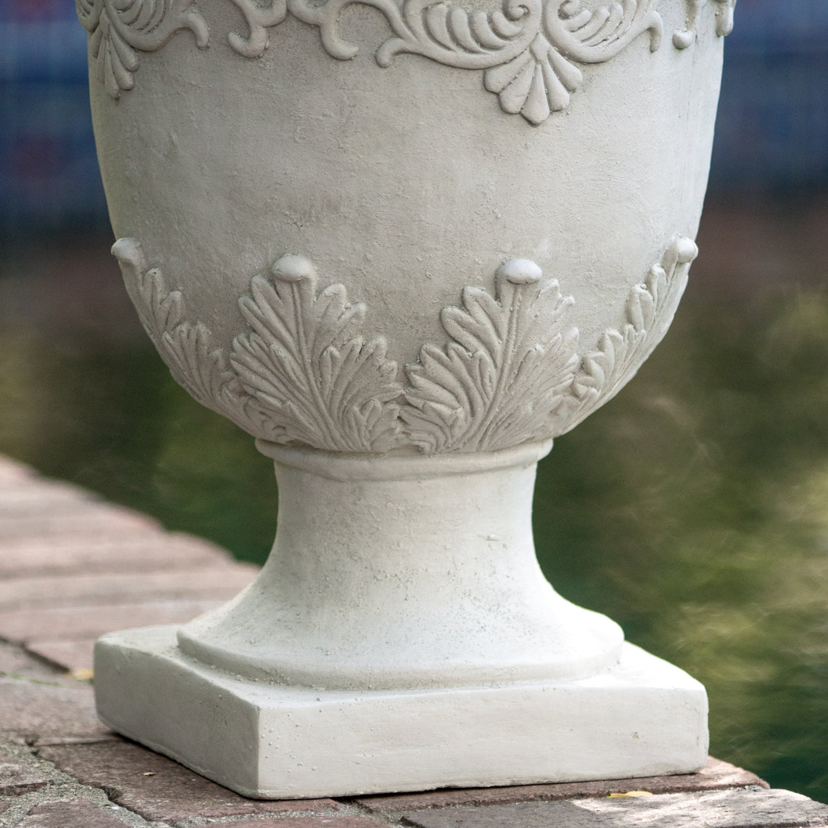 Moroccan Urn Planter by HouseOfZazla in stone-gray with leaf relief around rim on Tampa Home & Garden Store