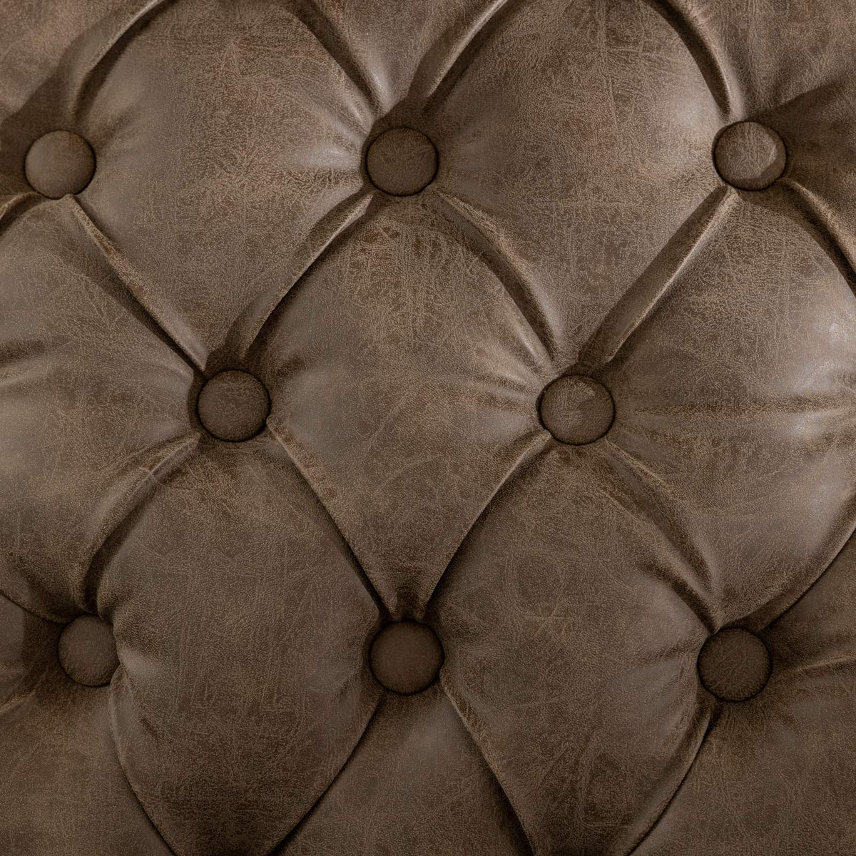 French style brown tufted leather chair upholstery with diamond button tufting on Tampa Home & Garden Store