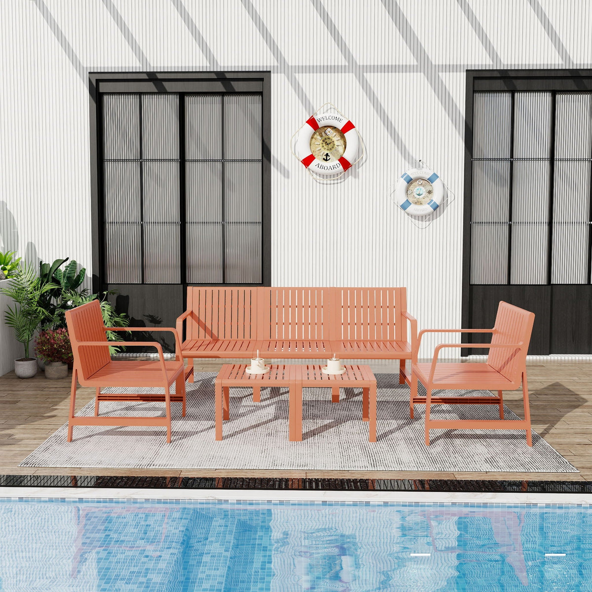 Waterproof 2-piece orange outdoor patio set with slatted chairs and coffee table by pool on Tampa Home & Garden Store