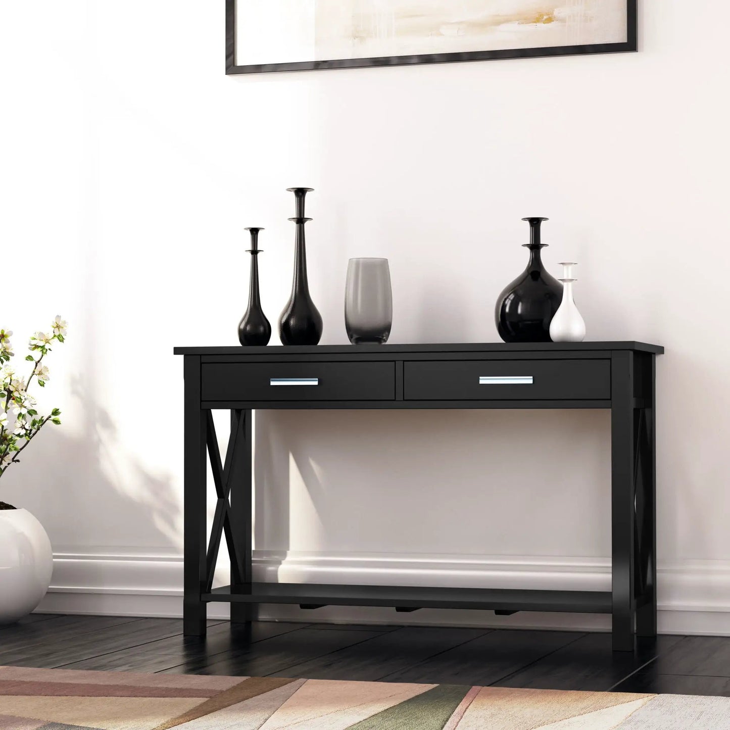 Kitchener handcrafted console table in black with drawers and a metal frame, top with vases on Tampa Home & Garden Store