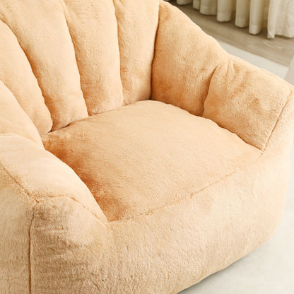 Beanbag sofa chair with armrests in soft beige plush fabric, close-up view on Tampa Home & Garden Store