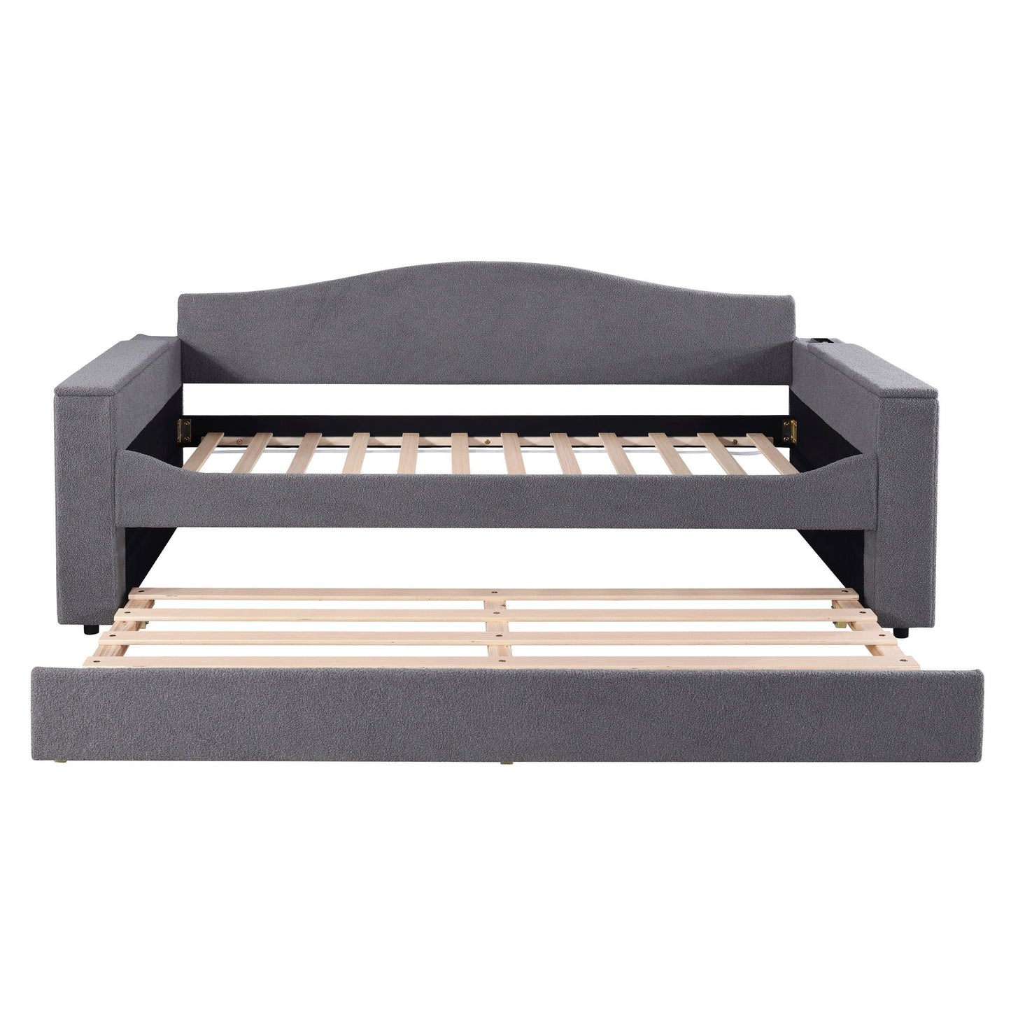 Upholstered gray daybed with curved back and square storage armrests, exposed wooden slat trundle on Tampa Home & Garden Store