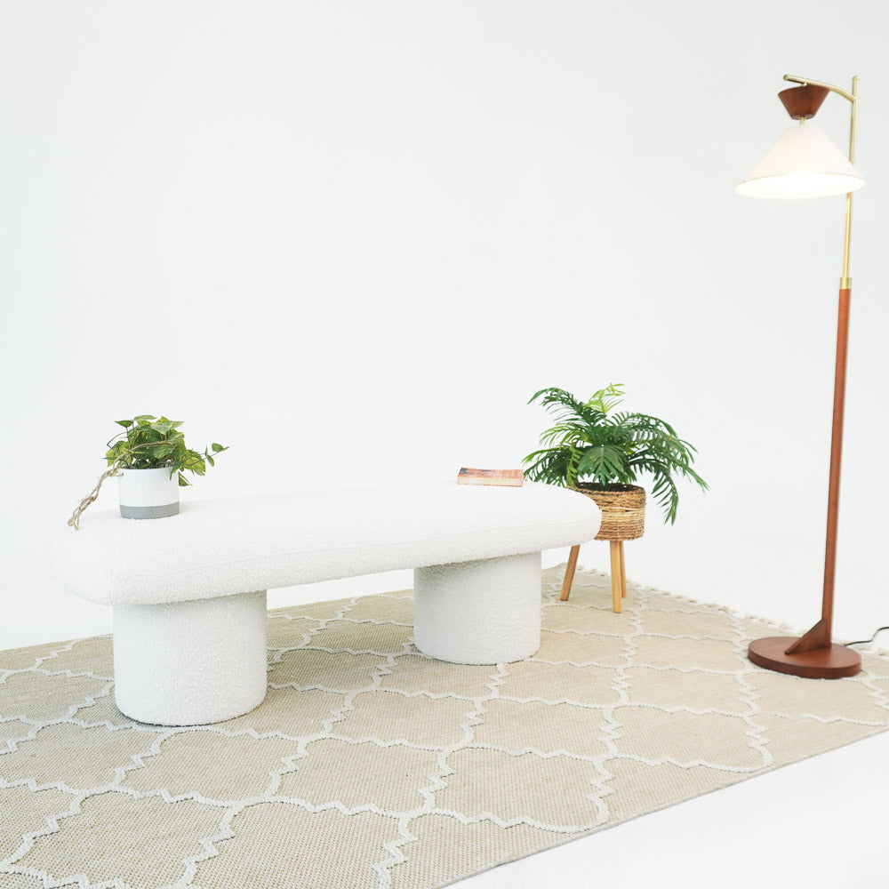 Ivory boucle upholstered bench Randolph by HouseOfZazla with curved top and twin pedestal bases on Tampa Home & Garden Store