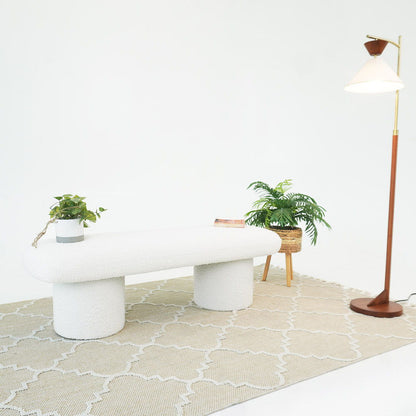 Ivory boucle upholstered bench Randolph by HouseOfZazla with curved top and twin pedestal bases on Tampa Home & Garden Store
