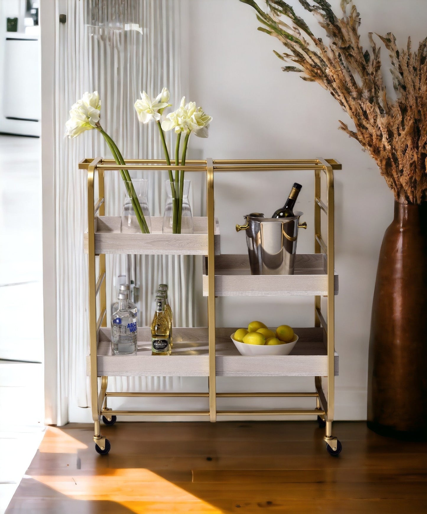 Vorrik gold and white washed finish serving cart glass shelves wheels HouseOfZazla on Tampa Home & Garden Store