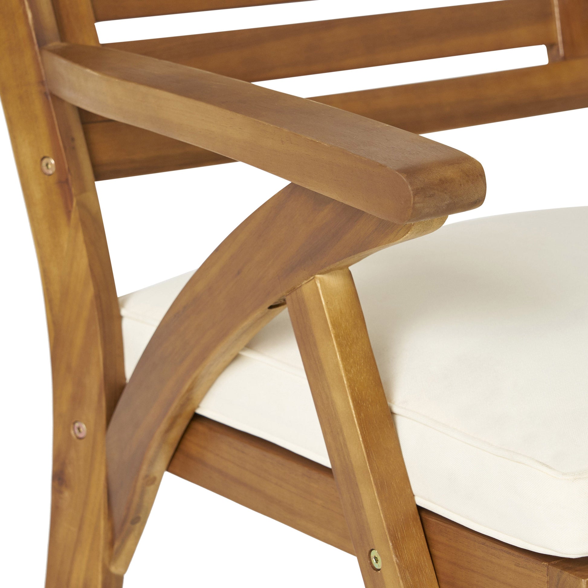 Outdoor acacia wood dining chair with cream cushion and crossbar legs on Tampa Home & Garden Store