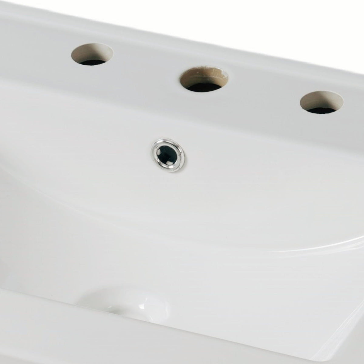 Bathtub edge with three circular jets and chrome drain on Tampa Home & Garden Store