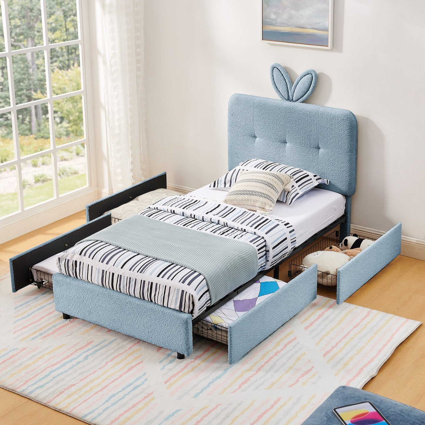 Twin size kids upholstered bed with oversized rabbit-ear headboard in blue fabric; two beds on Tampa Home & Garden Store