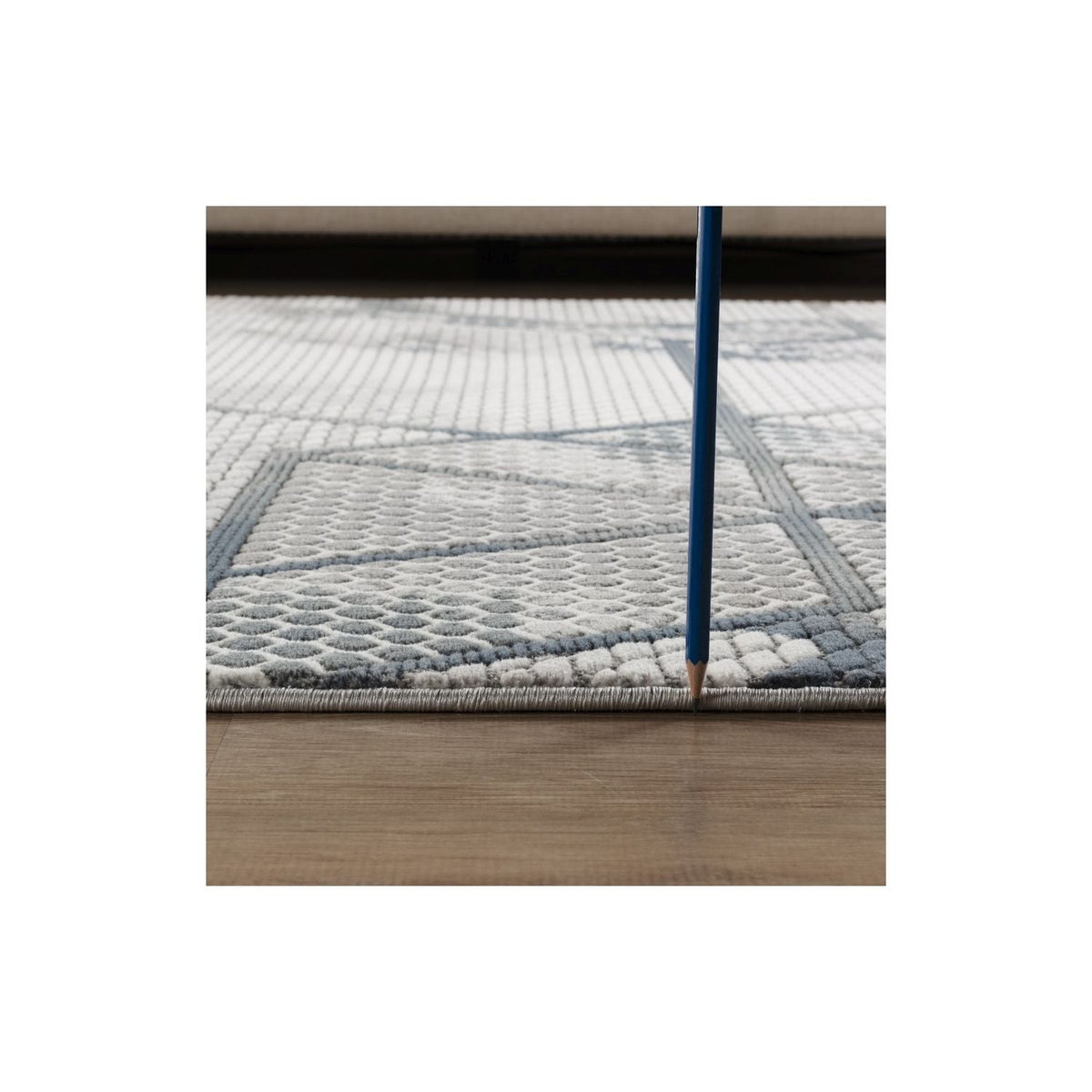 Modern 3D Geometric Ivory Gray Area Rug by HouseOfZazla on wood floor on Tampa Home & Garden Store