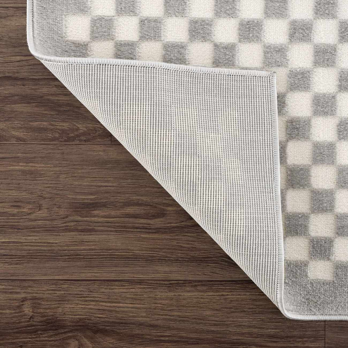 Gaiwan Cream Gray Washable Area Rug with a gray and ivory checkerboard pattern on Tampa Home & Garden Store