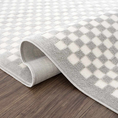 Gaiwan Cream Gray Washable Area Rug by Boutique Rugs with a checkered pattern on Tampa Home & Garden Store