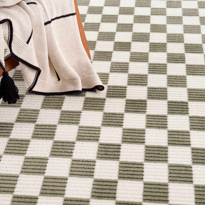 Kaysar olive green checkered washable area rug with cream squares Boutique Rugs on Tampa Home & Garden Store