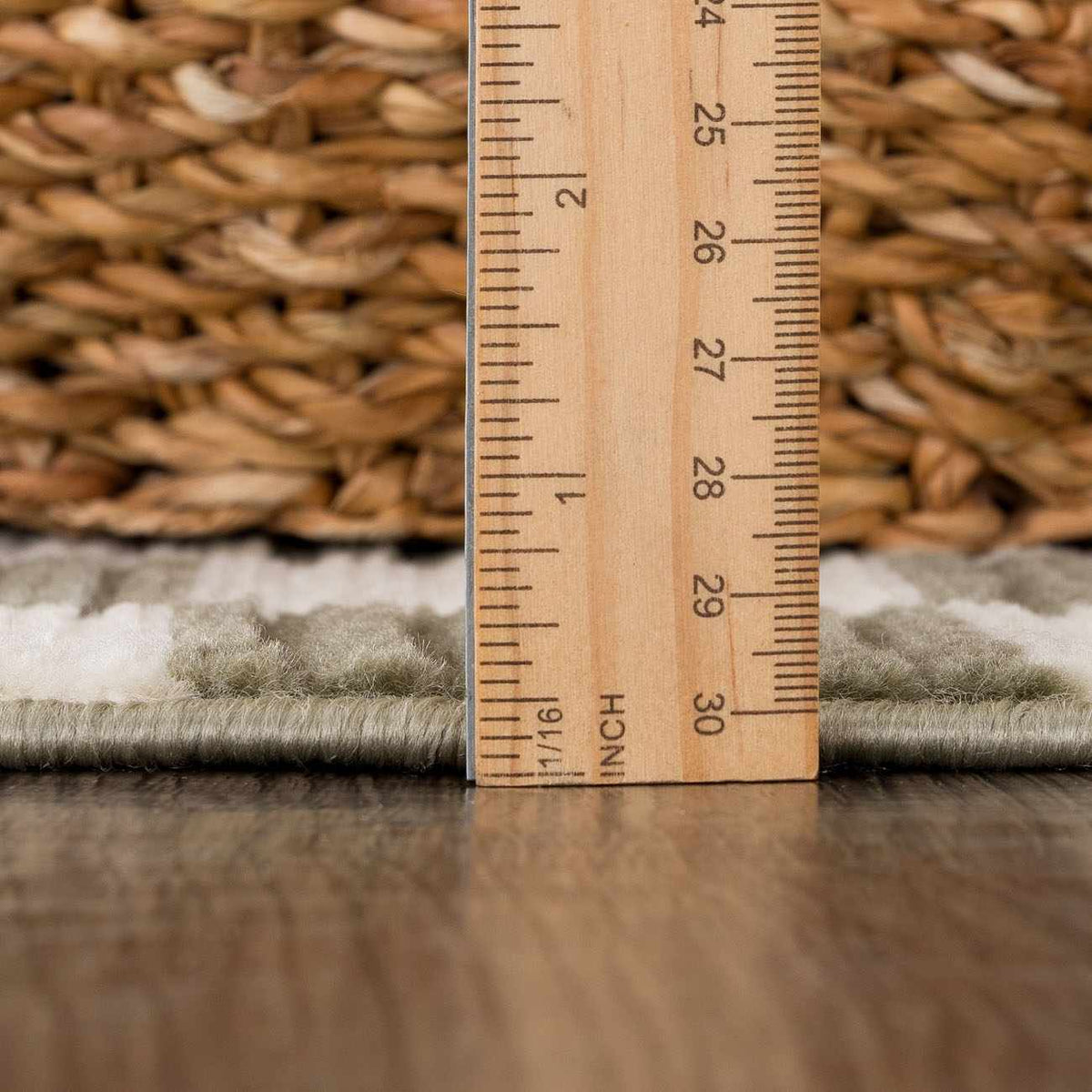 Kaysar olive green checkered washable area rug with plush pile beside a ruler for scale on Tampa Home & Garden Store