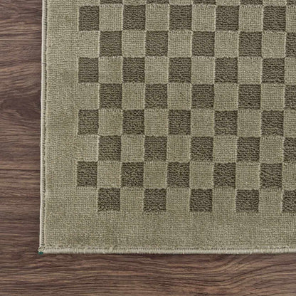 Gaiwan olive green washable area rug with checkerboard pattern on a wooden floor on Tampa Home & Garden Store
