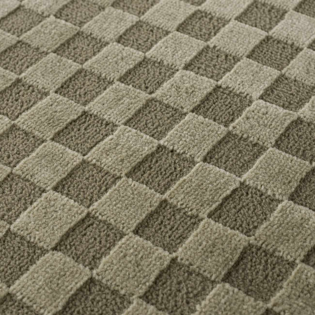 Gaiwan Olive Green Washable Area Rug with a square tufted checkerboard pattern Boutique Rugs on Tampa Home & Garden Store
