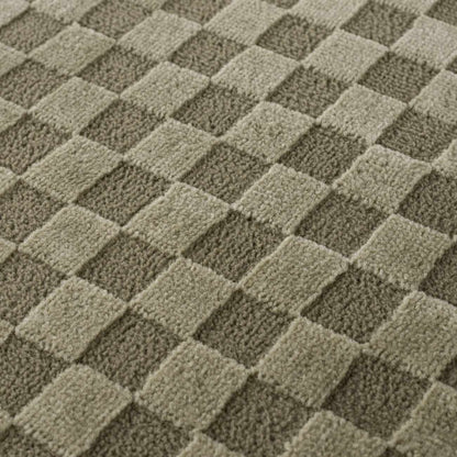 Gaiwan Olive Green Washable Area Rug with a square tufted checkerboard pattern Boutique Rugs on Tampa Home & Garden Store