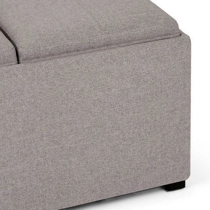 Avalon Square Storage Ottoman in grey textured fabric with visible stitching and black legs on Tampa Home & Garden Store