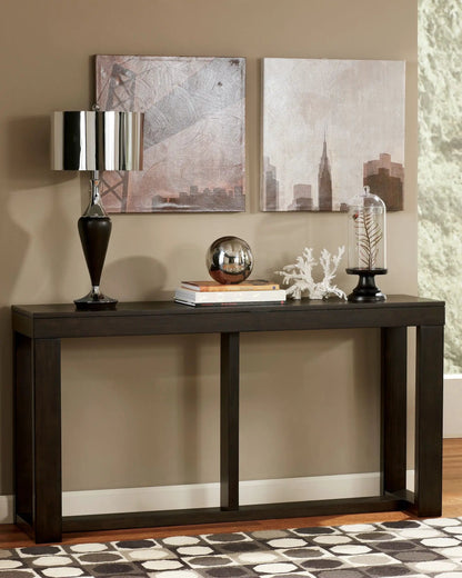 Watson sofa table dark brown wood with thick legs, topped with lamp and decor on Tampa Home & Garden Store
