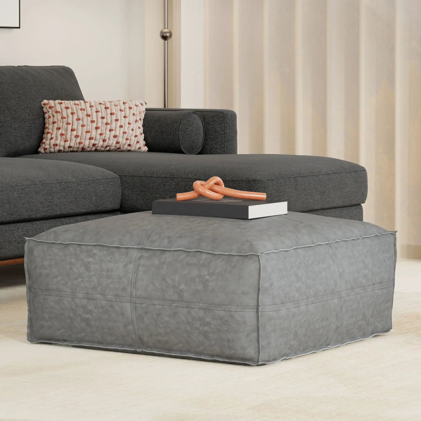Brody large square coffee table pouf in charcoal gray upholstery with stitched seams on Tampa Home & Garden Store