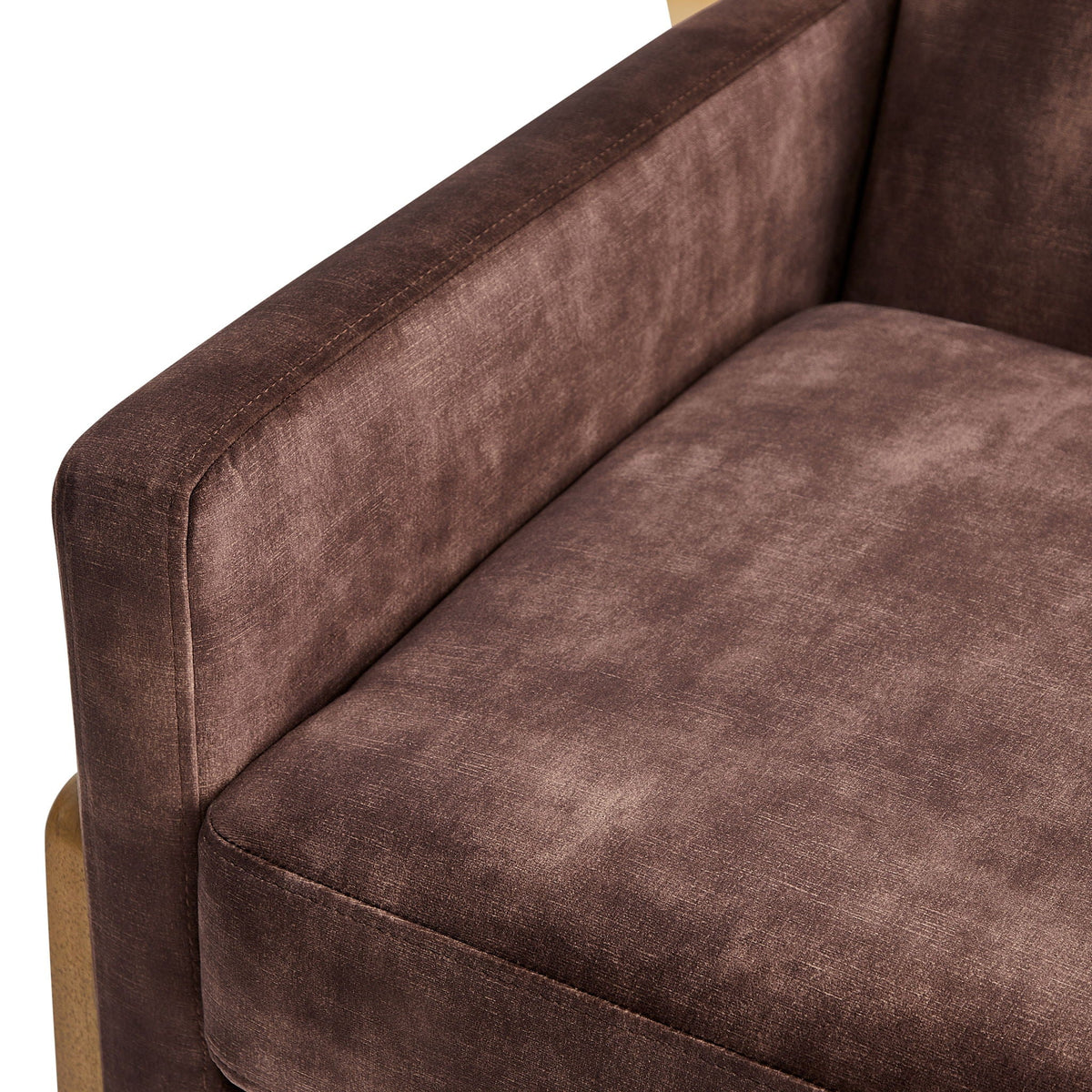 Dark brown fabric arm chair with stitched seams and wooden legs on Tampa Home & Garden Store