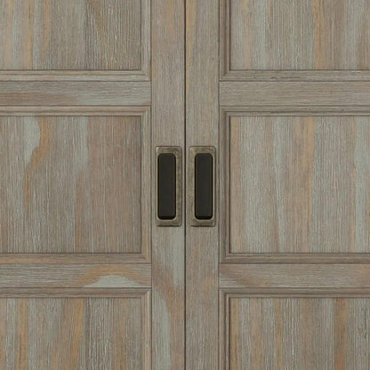 Burlington low storage cabinet, weathered gray wood panels with brass pulls on Tampa Home & Garden Store