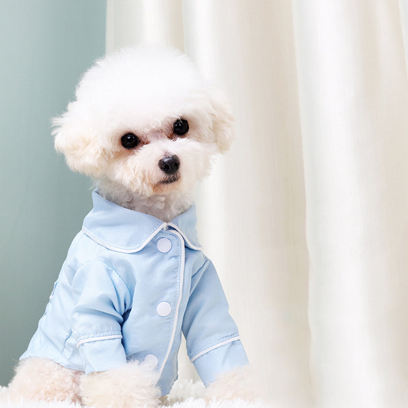 Pet Zen dog pajamas, light blue jacket with white snaps on a fluffy small dog on Tampa Home & Garden Store