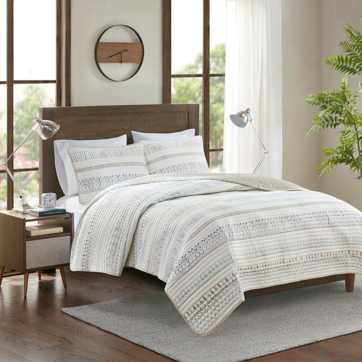 Printed Microfiber Seersucker Quilt Set by HouseOfZazla taupe/blue reversible design on bed on Tampa Home & Garden Store