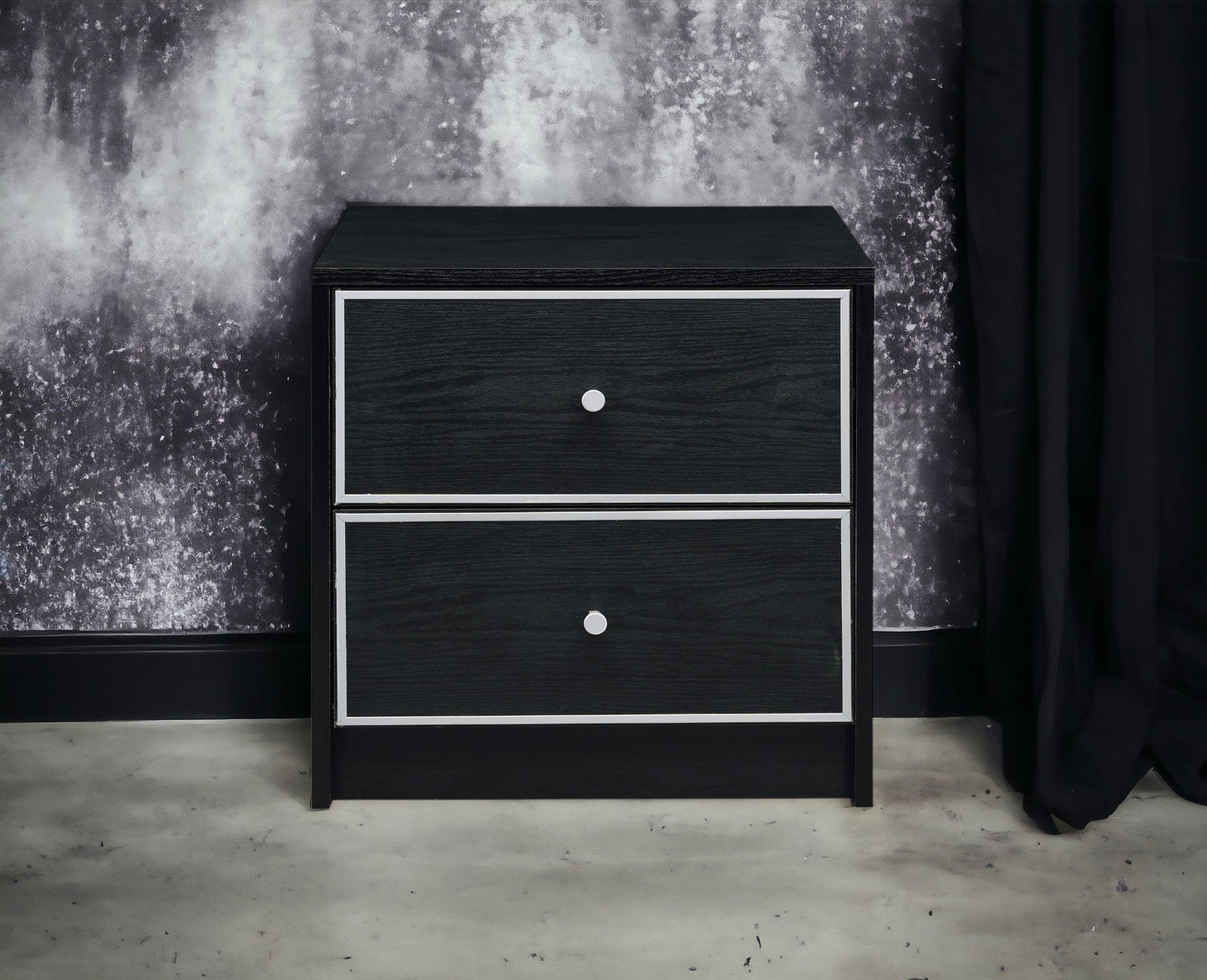 Modern black nightstand with three drawers, silver framed fronts and round metal knobs on Tampa Home & Garden Store