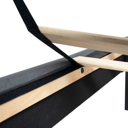 Queen size upholstered bed frame close-up showing light wood slats and black fabric straps on Tampa Home & Garden Store