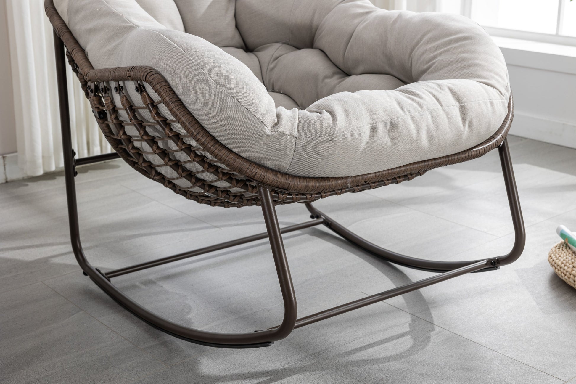 Outdoor rattan rocking chair with plush light gray cushion by HouseOfZazla on Tampa Home & Garden Store