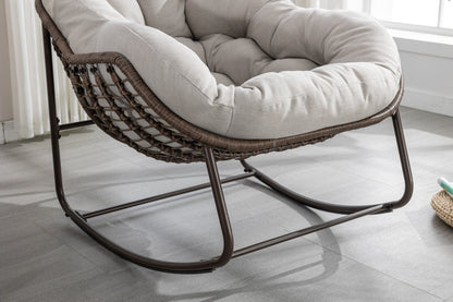 Outdoor rattan rocking chair with plush light gray cushion by HouseOfZazla on Tampa Home & Garden Store