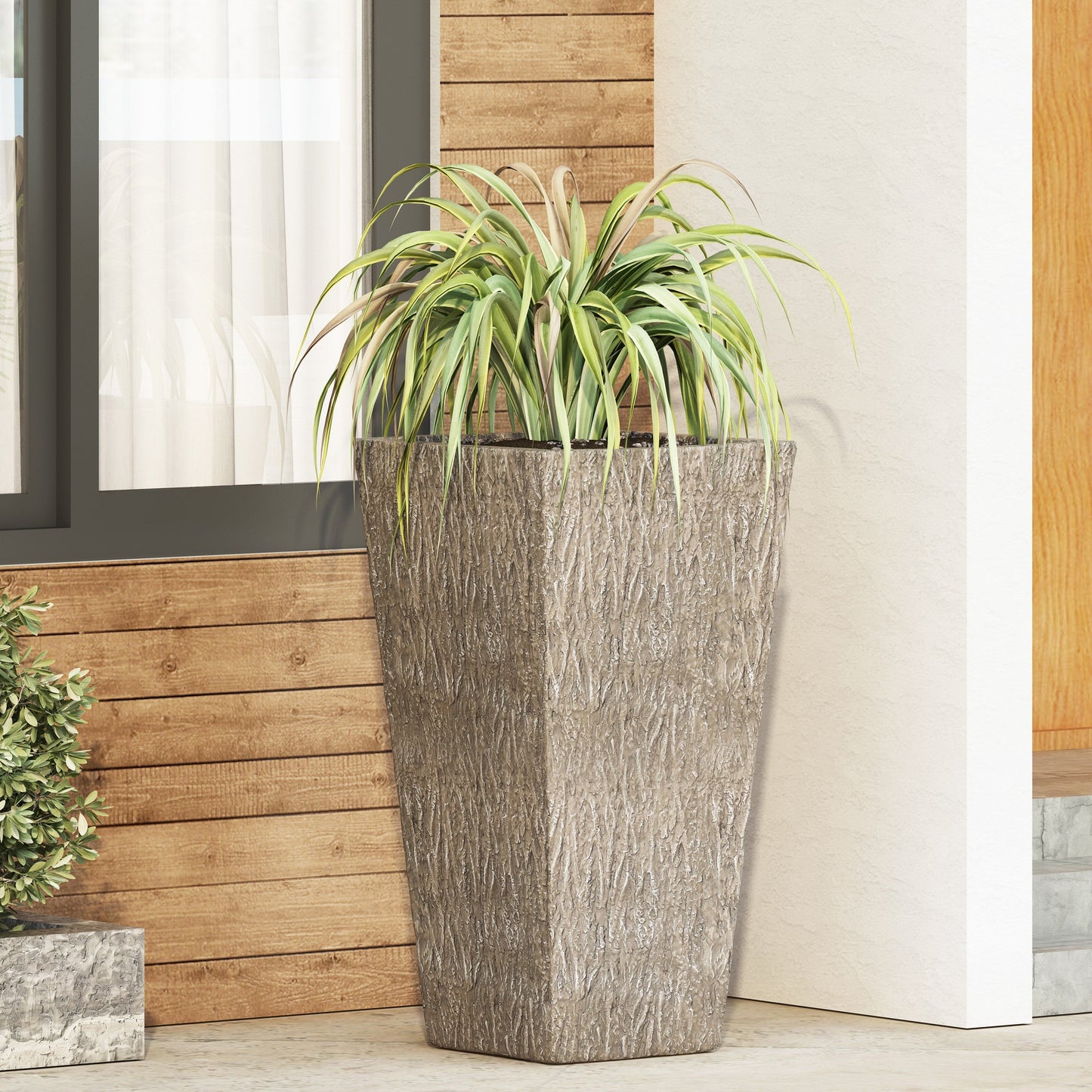MGO Planter by HouseOfZazla, textured grey planter with a variegated leafy plant on Tampa Home & Garden Store