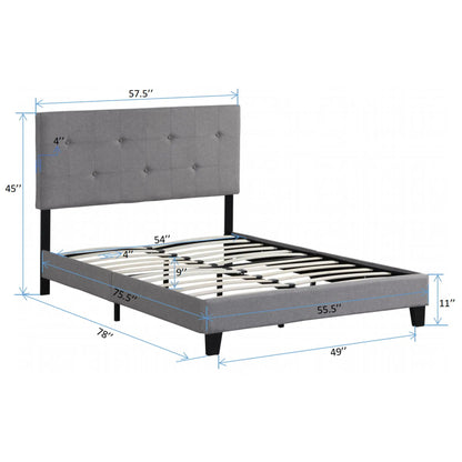 Modern upholstered platform bed with gray button-tufted headboard and wood slat support on Tampa Home & Garden Store