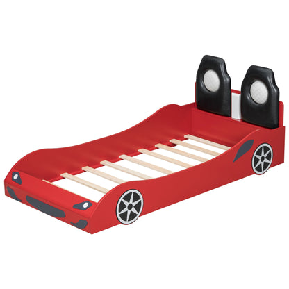 Race car shaped platform bed with red frame and dual black upholstered backrests on Tampa Home & Garden Store